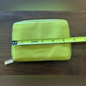 Hobo acid green zippy zip around wallet. Immensely practical.